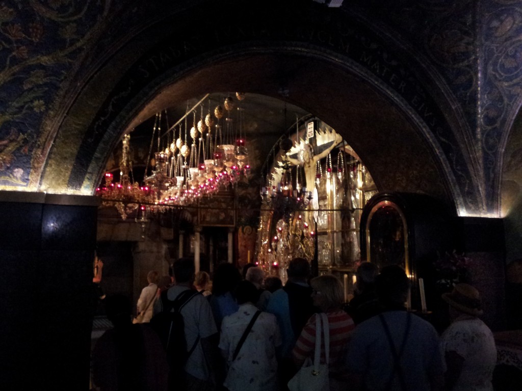 A view inside the subdued atmosphere of the Church of the Holy Sepulchre.