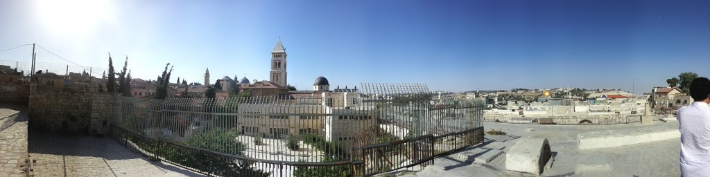 A panorama of the old city from rooftops near the Jewish Quarter. Visible is the Mount of Olives (far right, in the distance) and the Temple Mount (right quarter of the image, marked by the gold-domed Mosque).