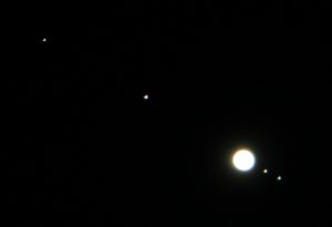 A longer exposure photograph of Jupiter at higher ISO. Jupiter's features are not as clear, but the Galilean Moons are easy to see.