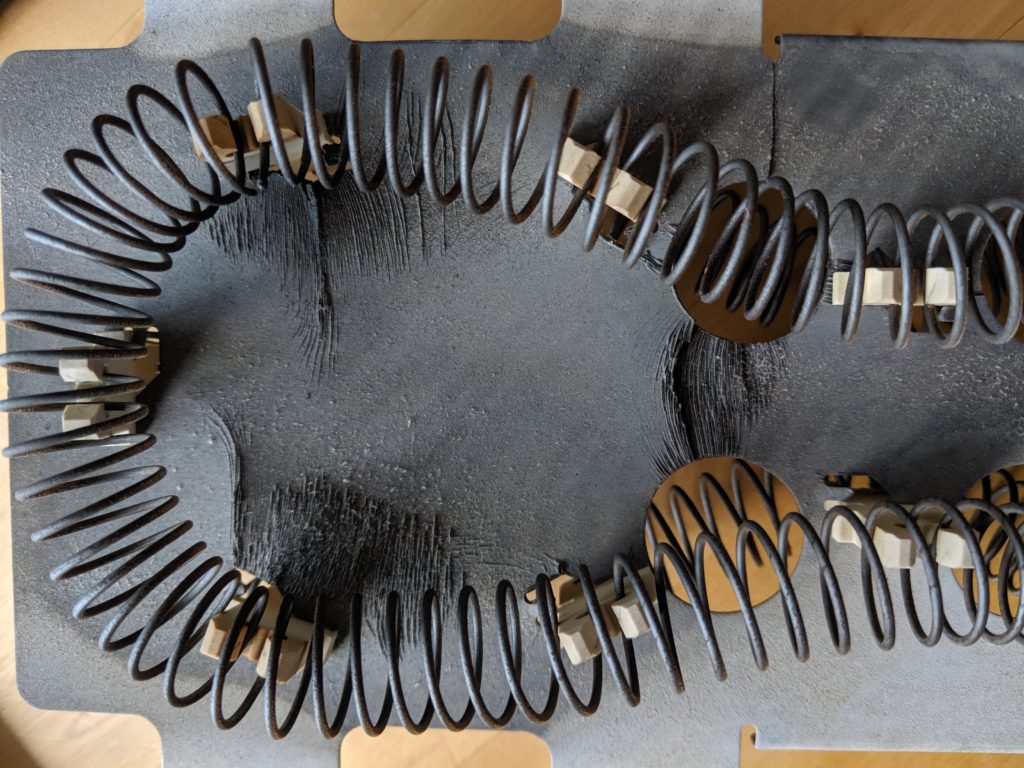 A clothes dryer heating element, 10 years old and broken