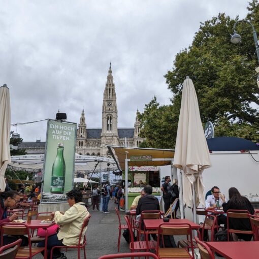 A view across the Rauthsplatz food market, The city hall is visible in the distance.