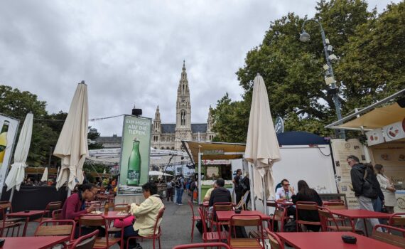 A view across the Rauthsplatz food market, The city hall is visible in the distance.