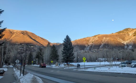 A view of mountains from a street in Aspen, CO, USA
