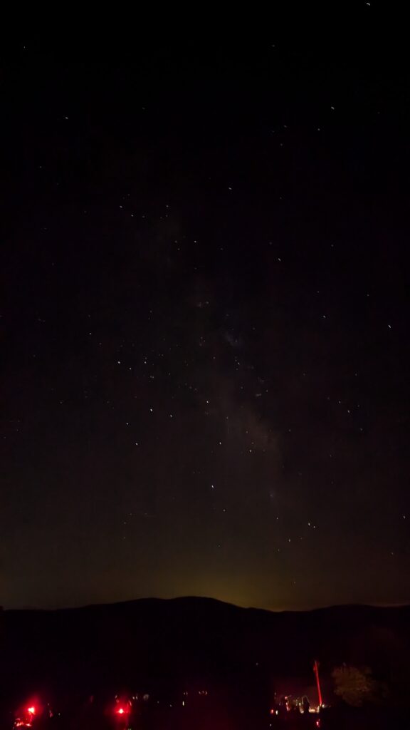 A night shot vision with a Pixel 9 camera of the sky over Stellafane East, showing stars and dust lanes in the Milky Way and our neighbourhood of stars