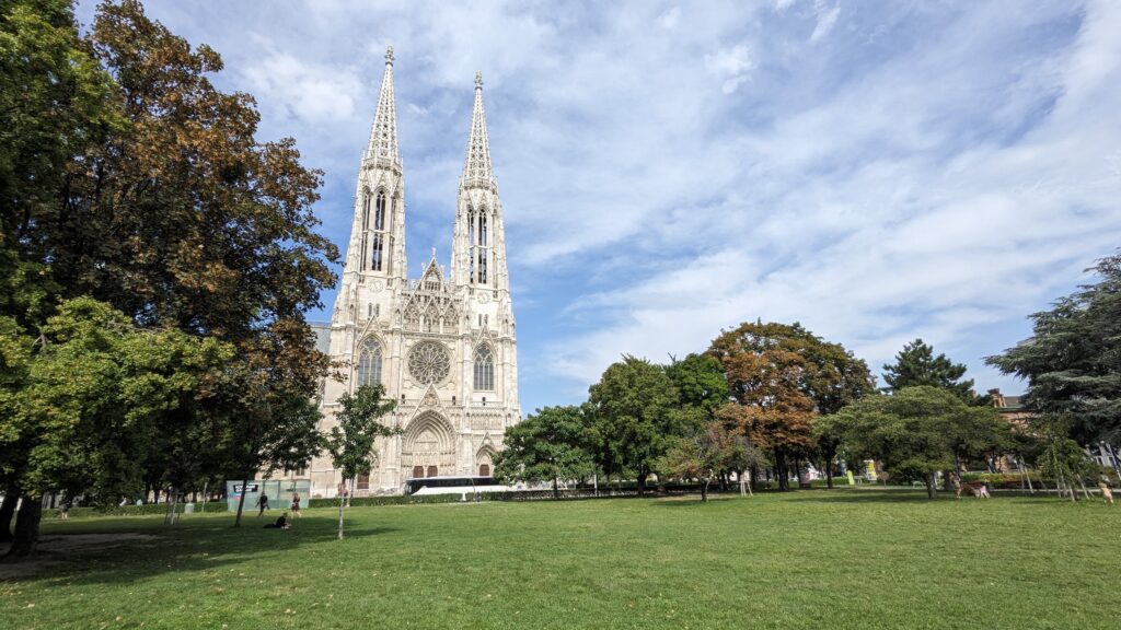 A photograph of a large Catholic cathedral, the Votivkirche, in Vienna.